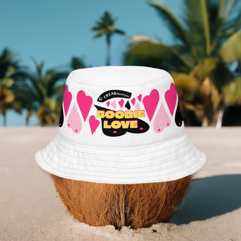 Boobie Love Bucket Hat on a coconut at the beach